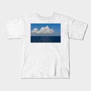 White cumulus clouds in sky over blue Baltic sea Kids T-Shirt